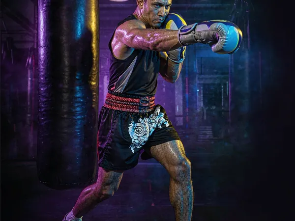 FG777 sports guide — boxer training beside a punching bag